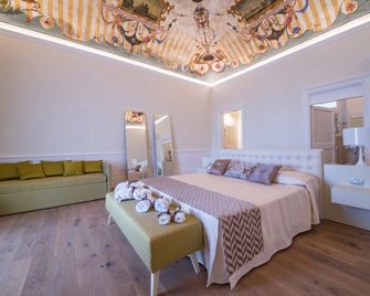 Hotel Il Palazzo - Assisi - Makuuhuone
