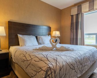 Best Western Plus South Edmonton Inn & Suites - אדמונטון - חדר שינה