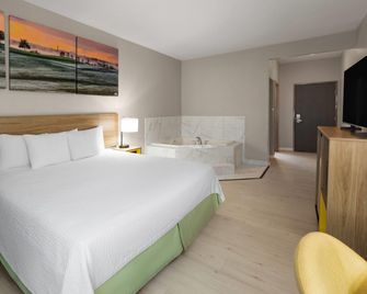 Days Inn & Suites by Wyndham Seaford - Seaford - Schlafzimmer