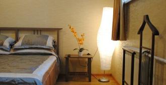 Hotel 12 Months - Novokuznetsk - Bedroom