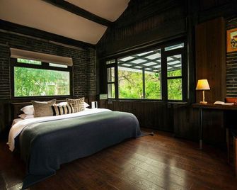 Lijiang Adonis Hotel - ליז'יאנג - חדר שינה