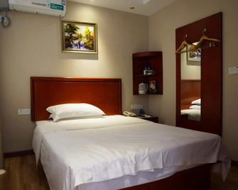 Greentree Inn Ganzhou Sankang Temple Darunfa Express Hotel - Ganzhou - Schlafzimmer