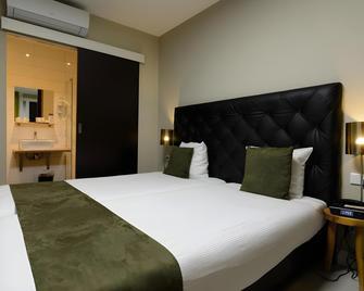 Camp-Inn Hotel - Am-xtéc-đam - Phòng ngủ
