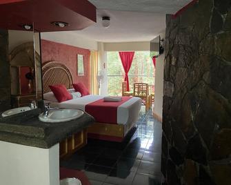 Hotel Alameda Suites - Orizaba - Schlafzimmer