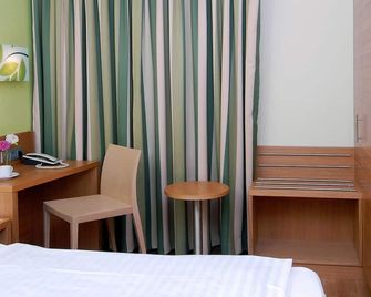 Business & Budget Hotel Tessin - Munic - Habitació