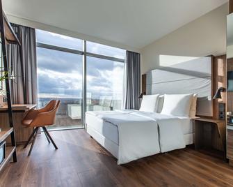 Radisson Blu Hotel, Frankfurt am Main - פרנקפורט אם מיין - חדר שינה