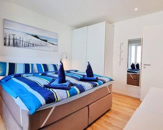 Neubau-Ferienwohnung Sandy Beach in erster Reihe an der Ostsee - Krummbek - Habitación