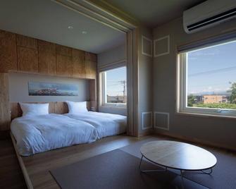 Jr Mobile Inn Furano - Furano - Bedroom