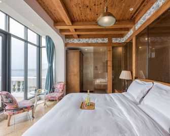 Villa Inn No 11 Seaside Qingdao - Qingdao - Schlafzimmer