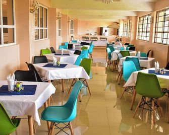 Amara Ridge Hotel Meru - Meru - Restaurante