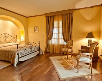 Tenuta Cusmano Villa Resort - Grottaferrata - Schlafzimmer