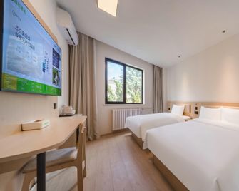 Hi Inn (Qingdao May Fourth Square Branch) - Qingdao - Habitación