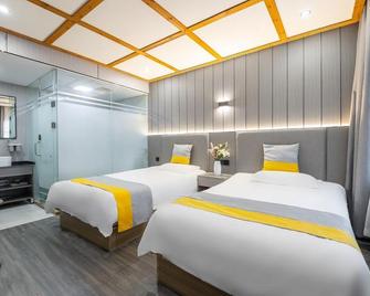 Hangzhou Dian Jia Hotel - Hangzhou - Habitación