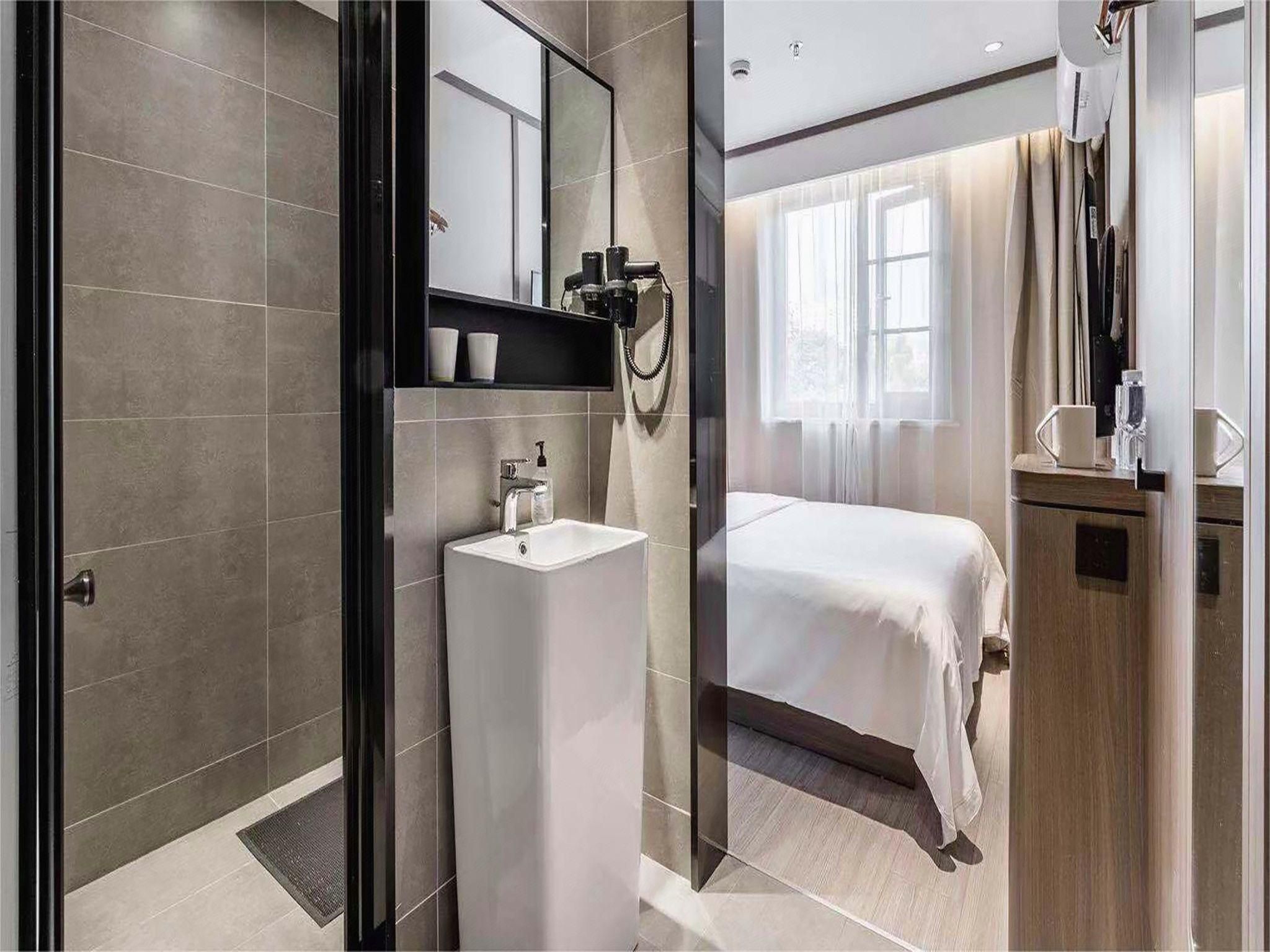 Hanting Hotel Shenzhen Huaqiang Center Park - שנג'ן - חדר שינה