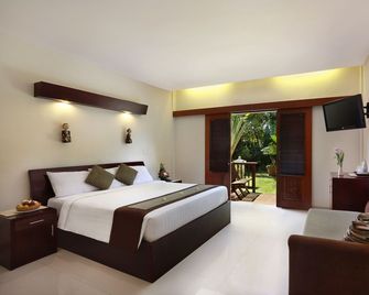 Respati Beach Hotel - Denpasar - Bedroom