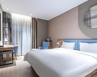 Home Inn Neo Ma'anshan Jiefang Road Yushan Lake Park - Ma'anshan - Slaapkamer