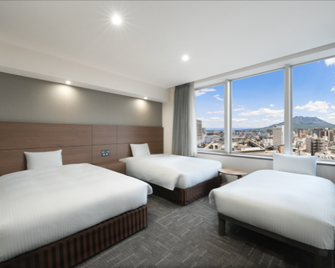 Hotel Oriental Express Kagoshima Tenmonkan - Kagoshima - Schlafzimmer
