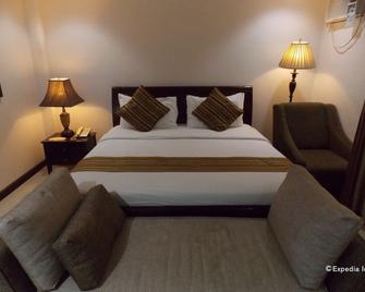 The Suites at Calle Nueva - Bacolod - Soveværelse