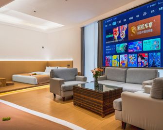 Tiantian Fishing Port Ceramics Hotel (Jingdezhen People's Square High-speed Railway Station) - Jingdezhen - Habitación