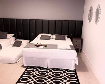 The Reds Pousada - פנייה - חדר שינה