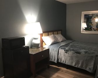 Lamplighter Motel - Longmont - Schlafzimmer