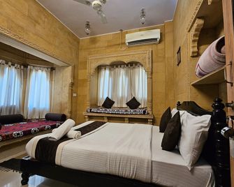 Hotel Royal Haveli - ג'יסלמר - חדר שינה