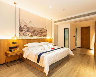 Huayuan Hotel (Danzhou Summer Plaza Branch) - Danzhou - Habitación