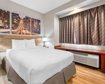 Days Inn by Wyndham near Kansas Speedway - קנזס סיטי - חדר שינה