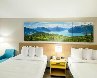 Days Inn & Suites by Wyndham Bossier City - Bossier City - Bedroom