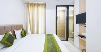 Treebo Avadh Residency - Indore - Bedroom