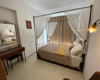 Anastasia Studios, Apartments & Suites - Archangelos - Ložnice