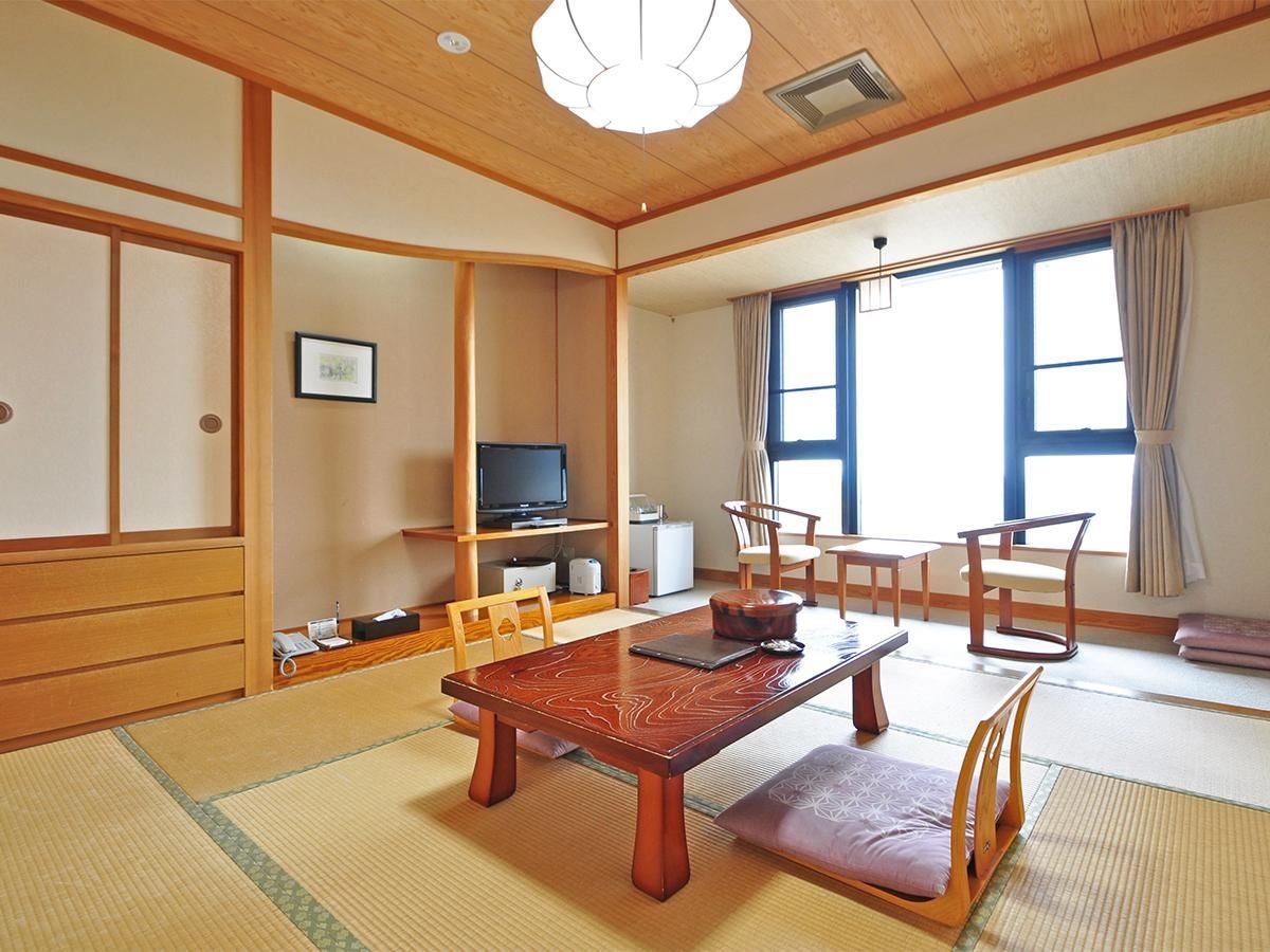 Hotel Grand Tenku - Semboku - Camera da letto