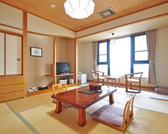 Hotel Grand Tenku - Semboku - Camera da letto