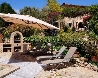 Relaxation In Mediterranean Garden Landscape At The Large Private Pool - Андрач - Патіо