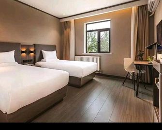 Hanting Hotel Cangzhou Jiefang Road - Cangzhou - Bedroom