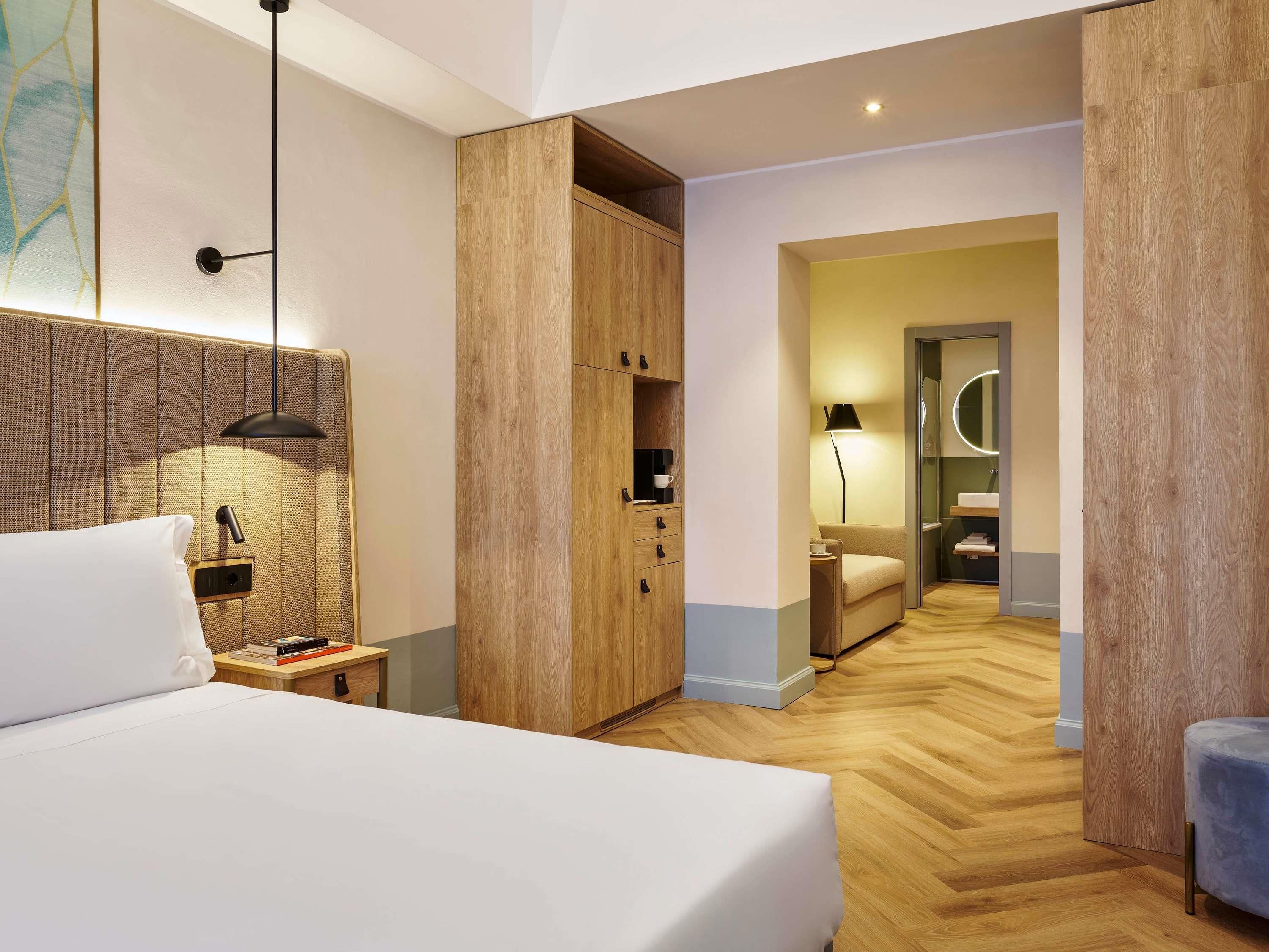 هوتل جياكومو مورا ألبا - هاندوريتين كوليكشن - ألبا - غرفة نوم