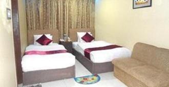 Grand Dhaka Hotel - דאהקא - חדר שינה