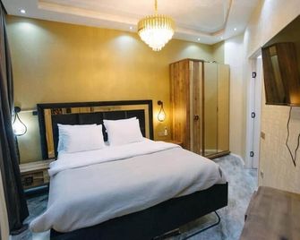 Steps Batumi - One Bedroom corner unit ocean view - Batumi - Bedroom