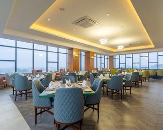 De Crown Inn - Jogīkuti - Restaurante