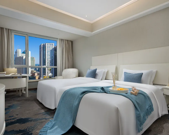 Xinwenyuan Hotel - Dalian - Habitación