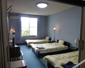Shimanami Ryokan - Imabari - Schlafzimmer