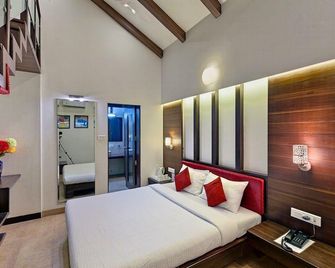 Shreyas Hotel - מהבלשוואר - חדר שינה