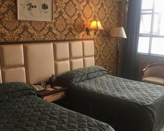 Longma Hotel - Honghe - Habitación