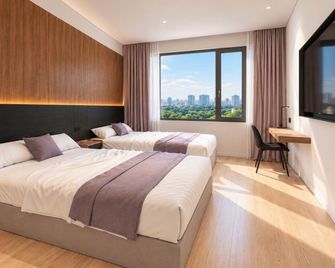 Kuannian Hotel (Chongqing West Railway Station Branch) - Chongqing - Bedroom