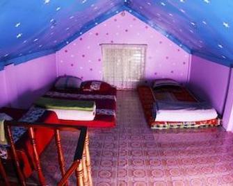 Nilborno Cottage - Srimangal - Habitación