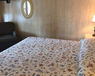Royal Palms Motel - Stuart - Schlafzimmer