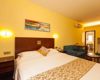 Chicago Suites International Hotel - Shenzhen - Bedroom