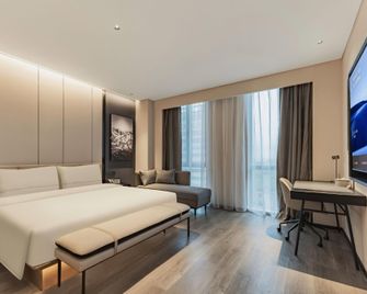 Atour Hotel Qingdao High-tech Zone Shimao Shopping Center - צ'ינגדאו - חדר שינה