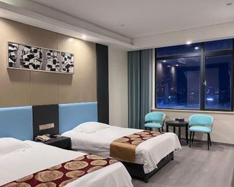 Gus Layton International Hotel - Nanchang - Κρεβατοκάμαρα