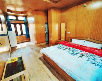 Hotel Tawang Centre Point - Tawang - غرفة نوم